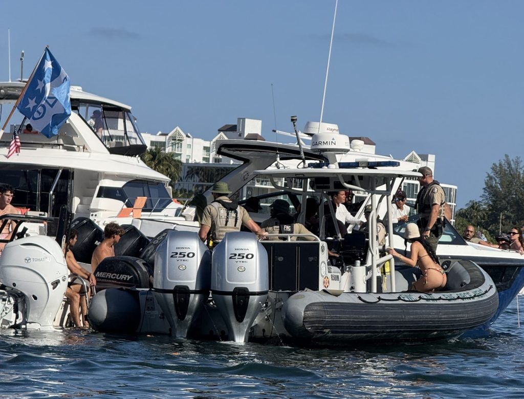 Police effectuating an arrest at the 2025 Boca Bash event. (Photo: Boca Daily News)